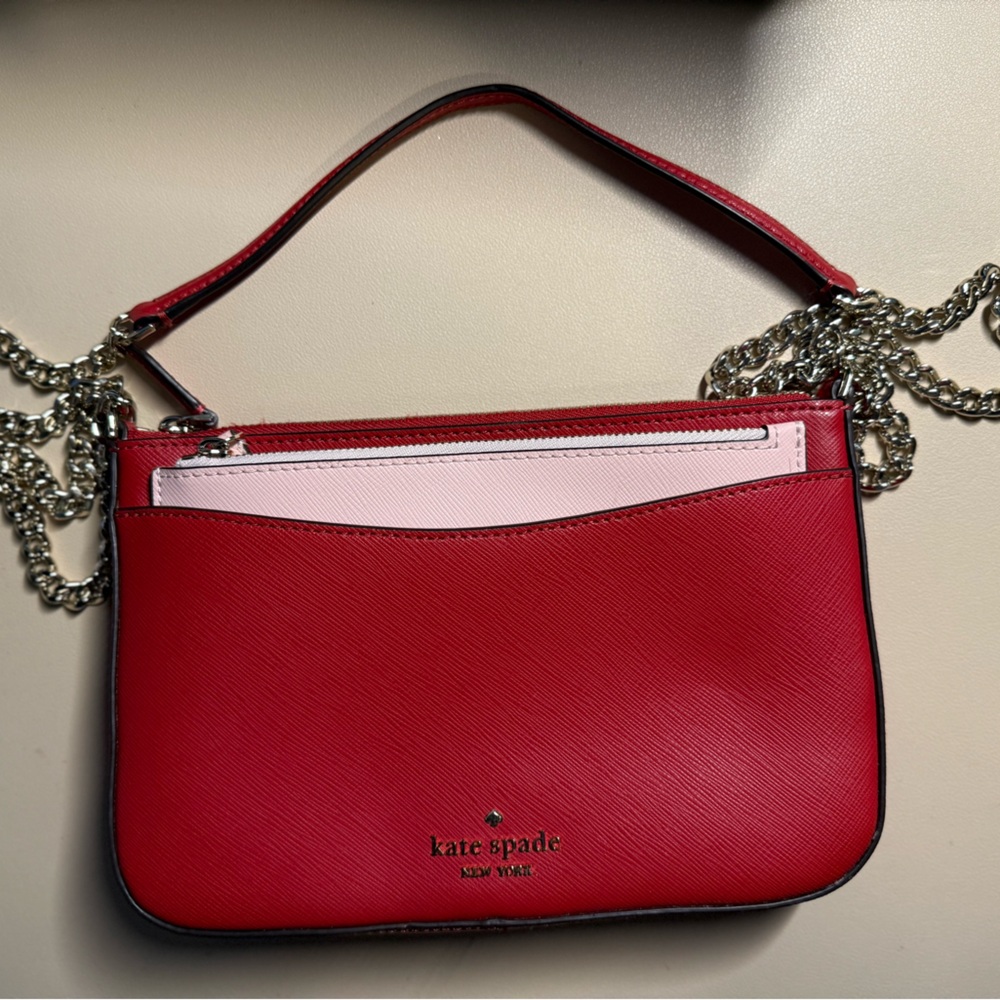 NWOT Kate Spade Sadie leather crossbody in Red with Pink wallet insert.